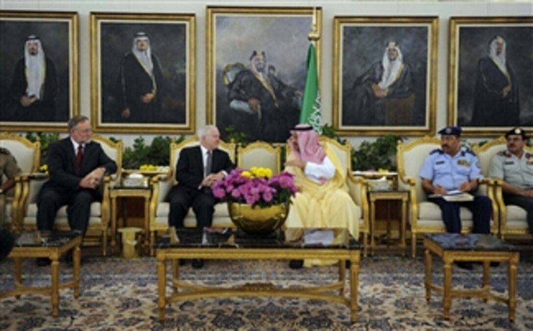 Secretary of Defense Robert M. Gates talks with Saudi Arabian Prince Khalid bin Sultan after arriving at King Khalid International Airport in Riyadh, Kingdom of Saudi Arabia, on Apr. 6, 2011.  