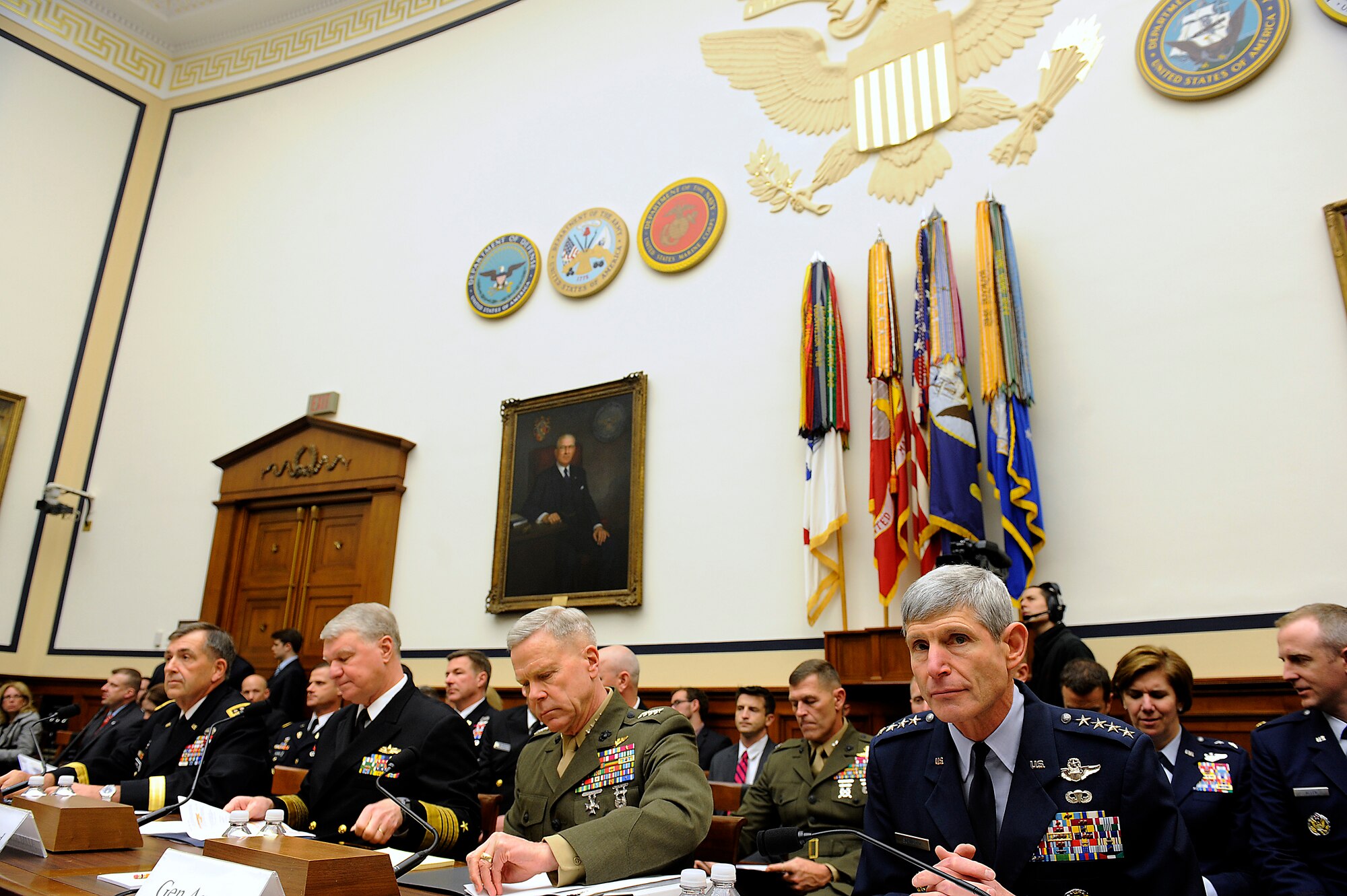 Air Force Chief of Staff Gen. Norton Schwartz (right) prepares to testify before the House Armed Services Committee in Washington, D.C., on April 7, 2011.  General Schwartz was joined by (left to right) Army Vice Chief of Staff Gen. Peter Chiarelli, Chief of Naval Operations Adm. Gary Roughead, and Marine Corps Commandant Gen. James Amos.  (U.S. Air Force photo/Scott M. Ash)
