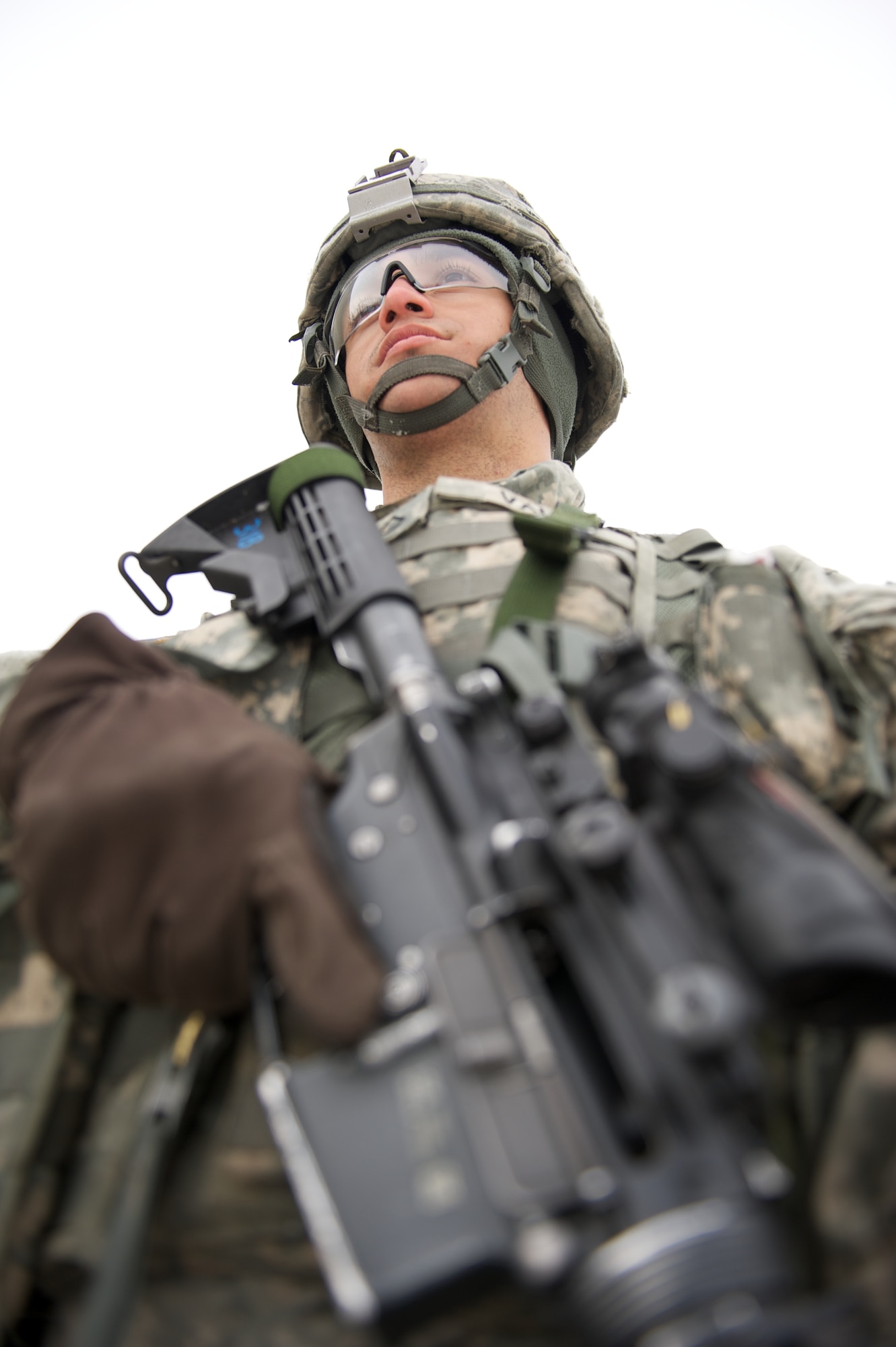 JOINT BASE ELMENDORF-RICHARDSON, Alaska ? Pfc. Norberto Valle, A Company, 1st Battalion, 501st Infantry Regiment (Airborne), prepares mentally, March 24, for the company's stress shoot at the Joint Base Elmendorf-Richardson range. (U.S. Air Force photo by David Bedard/Released)