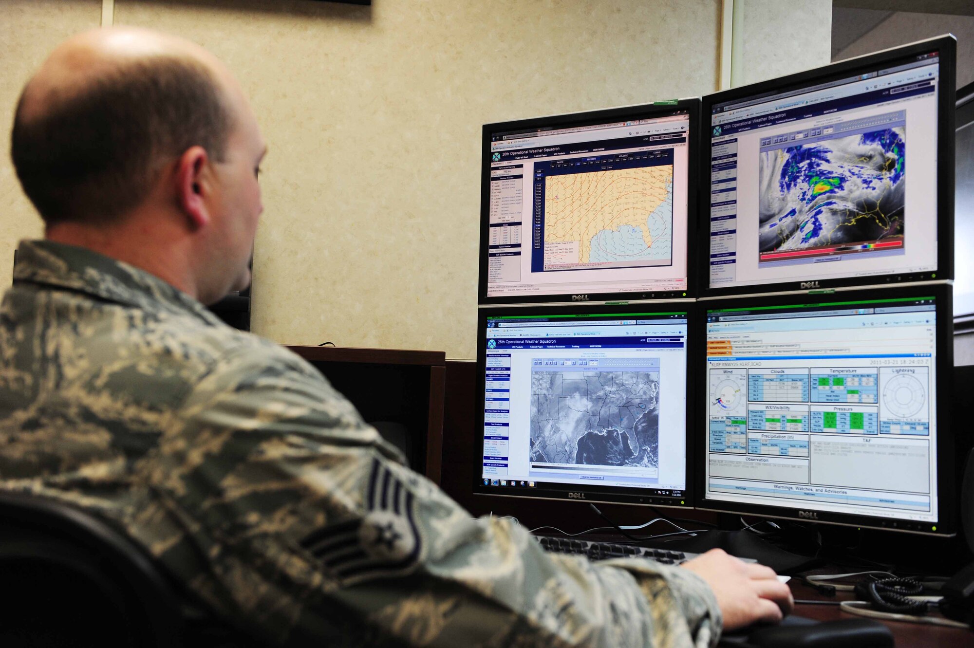 Staff Sgt. Michael Winders, a 19th Operations Support Squadron weather technician, tracks radar and satellite imagery to monitor the weather March 21, 2011, at Little Rock Air Force Base, Ark. The weather section provides specific terrestrial and space weather support for Air Force and Army operations. (U.S. Air Force photo by Senior Airman Jim Araos)