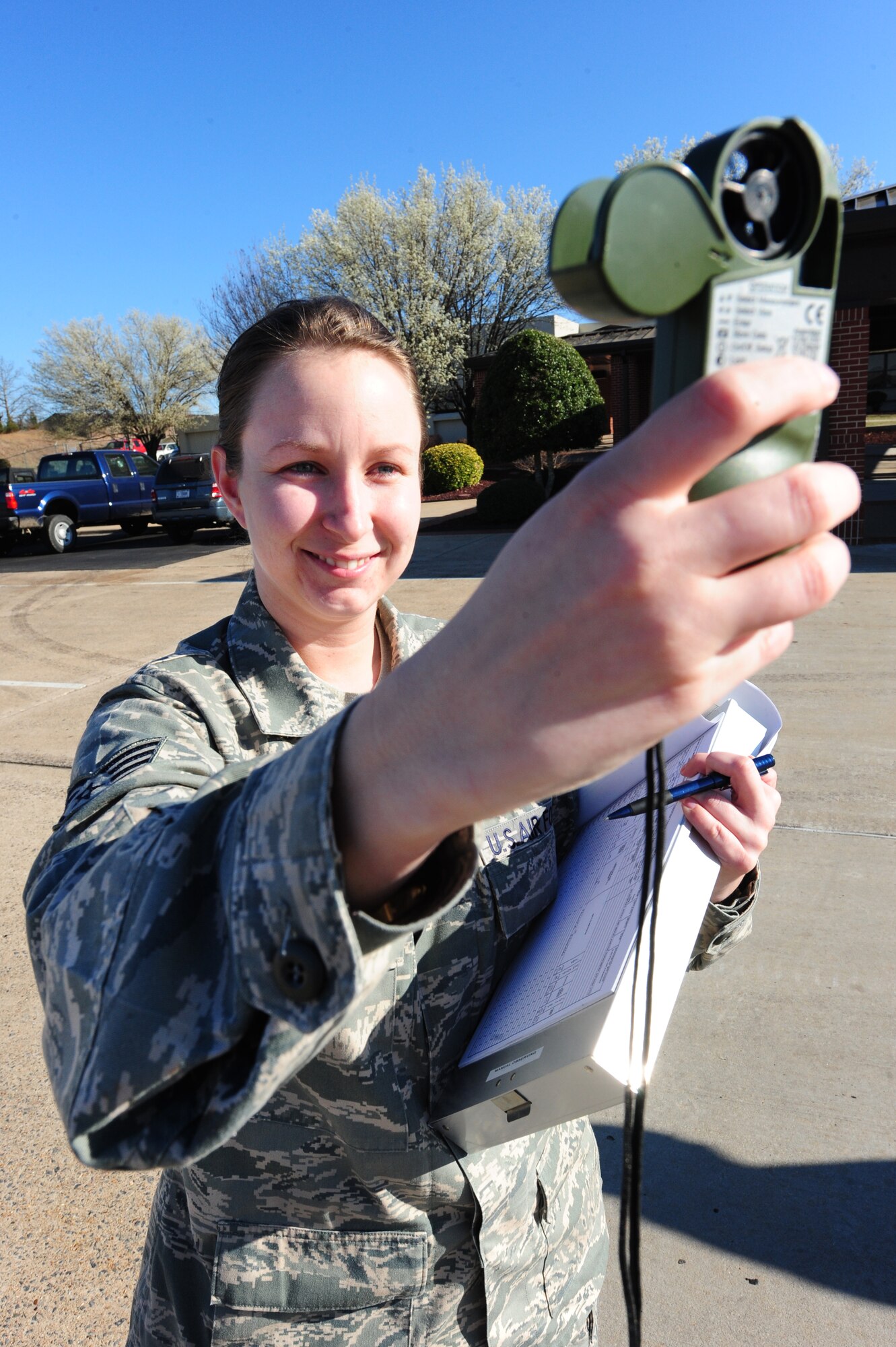 Staff Sgt. Sarah Peoples, a 19th Operational Support Squadron weather flight technician, observes the weather with a kestrel device March 1, 2011, at Little Rock Air Force Base, Ark. Kestrels are hand held weather monitoring devices that measure wind speed, temperature, dew point and altimeter. (U.S. Air Force photo by Senior Airman Jim Araos)