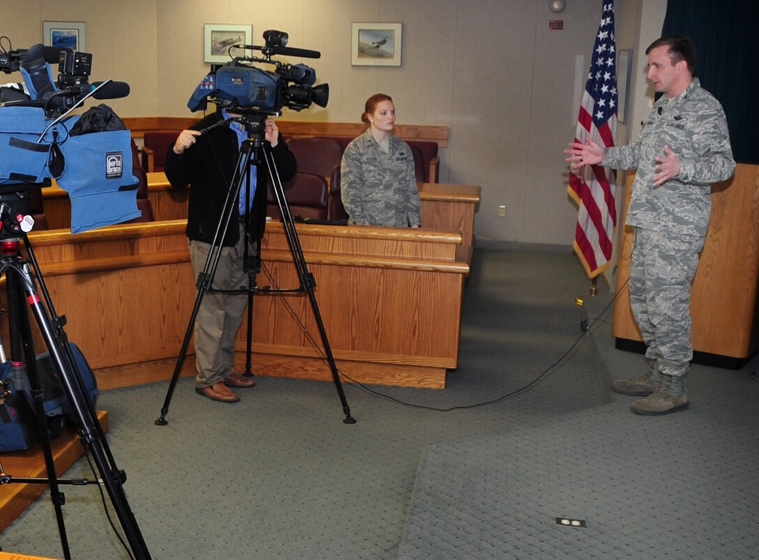 (Right) Col. Jeffrey Taliaferro, 28th Bomb Wing commander, briefs the media representatives during the State of Ellsworth brief at Ellsworth Air Force Base S.D., April 5, 2011.  The purpose of this meeting was to orient and update local news media on the base mission and events tied to Ellsworth. (U.S. Air Force photo/Senior Airman Anthony Sanchelli)
