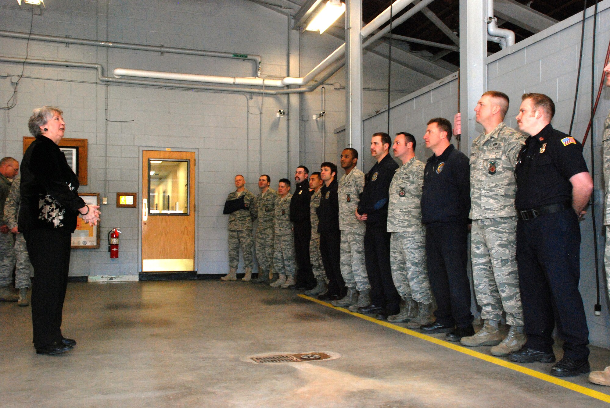 Ann Mitchell, Air Force Global Strike Command’s Director of Logistics, Installations and Mission Support, speaks with members of F. E. Warren’s fire department during her familiarization tour here March 30 through April 1. She congratulated the team for earning the Defense Department’s Best Small Fire Department award and four major-command awards. (U.S. Air Force photo by Senior Airman Daryl Knee)