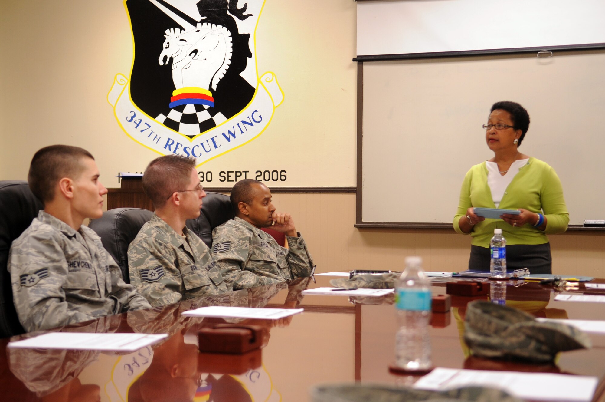 MOODY AIR FORCE BASE, Ga. -- Moody members listen as Frances Elmore, Moody sexual assault response coordinator, gives examples of what to do if someone happens to witness a sexual assault during bystander intervention training April 6.  Males, females and leadership were split up into different sessions to help encourage them to speak freely. (U.S. Air Force photo/Airman 1st Class Douglas Ellis)(RELEASED)
