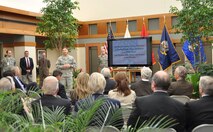 Col. Thomas C. Joyce, Air Force Mortuary Affairs Operations commander, highlights the mortuary mission with members of the USO Board of Governors at the Charles C. Carson Center for Mortuary Affairs April 6, 2011. The group took a tour of the mortuary, the Center for Families of the Fallen and the Meditation Pavilion at the Fisher House for Families of the Fallen. "The leaders expressed heartfelt appreciation and thanks for the wonderful job all of our civilians, Airmen, Soldiers, Sailors, Marines, and USO teammates and volunteers do in caring for our Fallen Heroes and their families,” said Colonel Joyce.  (U.S. Air Force photo/Christin Michaud)