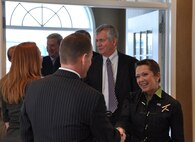 Members of the USO Board of Governors are greeted as they enter the Meditation Pavilion April 6, 2011. The BOG toured the Center for Families of the Fallen and the Charles C. Carson Center for Mortuary Affairs. (U.S. Air Force photo/Christin Michaud)