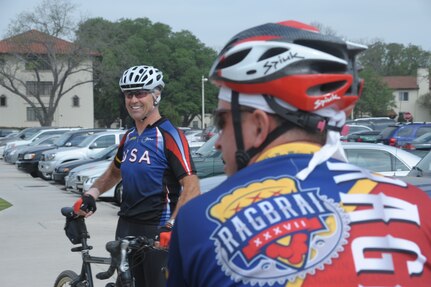 Mr. George Heagerty, teaches proper safety fundamentals in bike riding. The bike ride begins at the Rambler Fitness Center, Randolph Air Force Base, Texas, then goes out Perimeter Gate and into the housing development area.  The bike ride covers about 17 miles. (U.S. Air Force Photo/Joel Martinez)