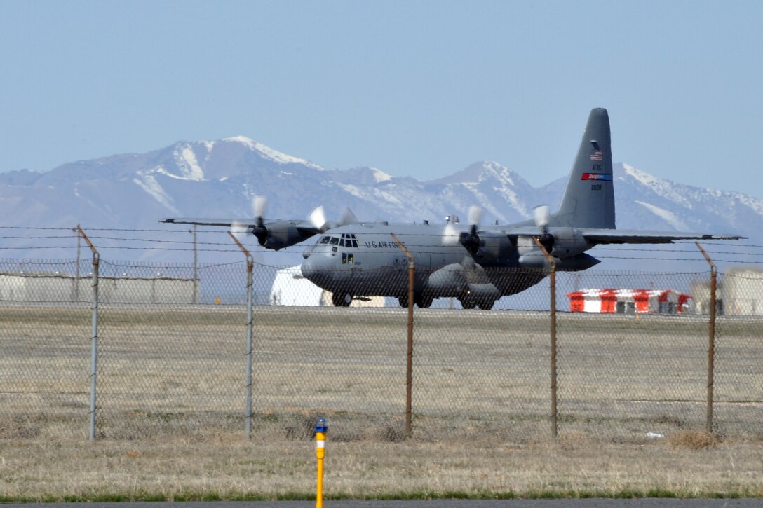 HILL AIR FORCE BASE, Utah -- A C-130 Hercules tactical cargo transport aircraft, assigned to the Air Force Reserve's 910th Airlift Wing, prepares to take off on a flight to apply an herbicide mixture to more than 1200 acres of target areas on the Utah Test and Training Range, approximately a 20-minute flight from here, March 31. The C-130 is equipped with a Modular Aerial Spray System (MASS) and the aircraft's crew is extensively trained to conduct this mission while flying at approximately 100 feet above the surface at a ground speed of 200 knots or more than 337 feet per second. The 910th, based at Youngstown Air Reserve Station, Ohio, home to the Department of Defense's only large-area fixed wing aerial spray unit, has been tasked, through April 7, with controlling Halogeton, an evasive weed that can hamper bombing test evaluations and unexploded ordinance recovery. U.S. Air Force photo by Master Sgt. Bob Barko Jr.
