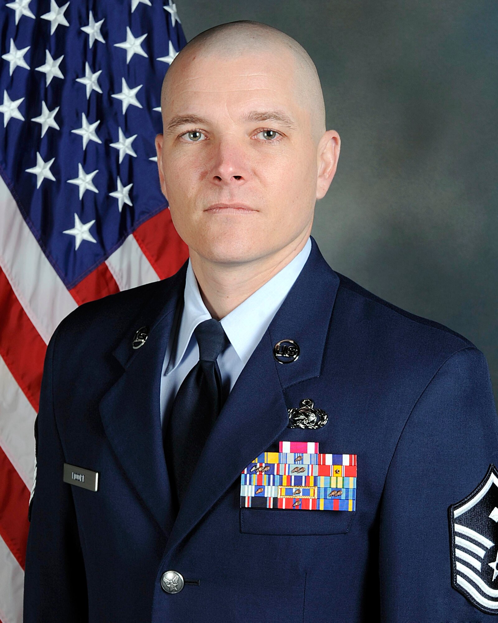 Master Sgt. Michael Moore Jr., from the 92nd Security Forces Squadron at Fairchild Air Force Base, Wash., was named the 2010 Air Mobility Command First Sergeant of the Year.  According to his award information, in 2010 he deployed to Kandahar Airfield, Afghanistan, on a joint expeditionary tasking in support of Operation Enduring Freedom. During his deployment Sergeant Moore was “responsible for the morale and welfare of 825 warriors spanning 88 Air Force specialty codes across 54 forward operating bases.” He established personnel programs that were replicated across the theater and his leadership “led to his selection as the 92nd Air Refueling Wing’s Lance P. Sijan Award nominee” for 2010. (U.S. Air Force Photo)


