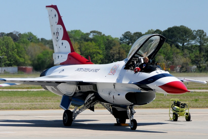 Capt. Kristin Hubbard prepares to exit Thunderbird 8 after conducting a local familiarization flight April 6, at Joint Base Charleston. These flights are conducted in order for the pilots to find landmarks surrounding the flight line so they know their boundaries. Captain Hubbard is an advanced pilot and narrator with the U.S. Air Force Thunderbirds. (U.S. Air Force photo/Airman 1st Class Ian Hoachlander)