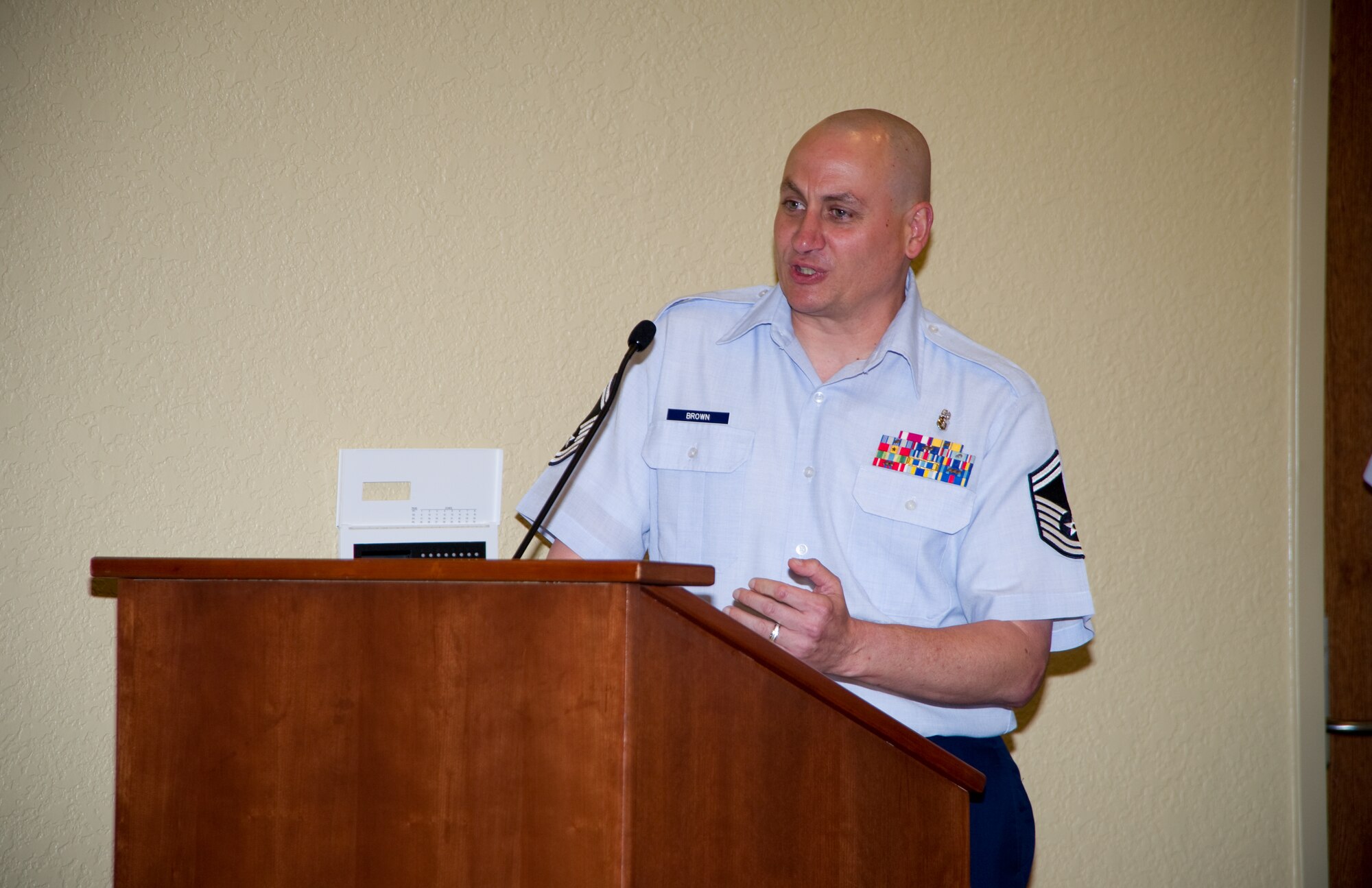 Senior Master Sgt. Timothy Brown, 81st Diagnostics and Therapeutics Squadron, talks about assistance he received from the Air Force Aid Society, one of four charities supported by the Air Force Assistance Fund.  Sergeant Brown was one of the speakers
at the official AFAF kickoff at the Bay Breeze Event Center before Monday’s promotion ceremony. As of Monday, $8,488 has been pledged toward Keesler’s 2011 goal of $83,109.  (U.S. Air Force photo by Adam Bond)