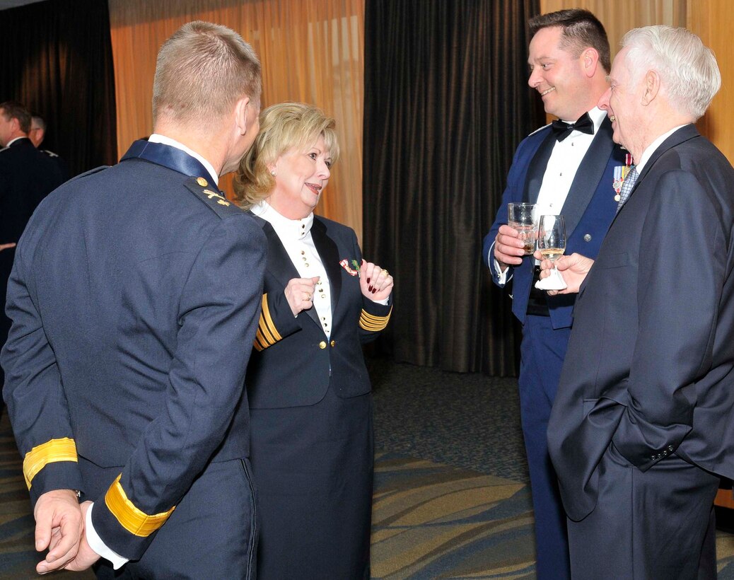 Canadian Senator Pamela Wallin speaks with (left to right) Brig. Gen. Christopher Coates, Continental U.S. NORAD Region deputy commander, Col. Mark Zechman, Air Forces Northern Deputy A3, and Larry Dantzler, Bay Defense Alliance, during the 87th Annual Maple Leaf Mess Dinner at Tyndall Air Force Base, Fla., April 2. Senator Wallin, who serves as the chair of the Canadian Senate's National Security and Defense Committee, was the special guest of honor for the event which celebrated the 87th anniversary of the Royal Canadian Air Force. All Canadian military members stationed at Tyndall belong to the Maple Leaf Mess, and U.S. military partners and civic leaders are invited to participate in their annual tradition. (U.S. Air Force photo by Lisa Norman)