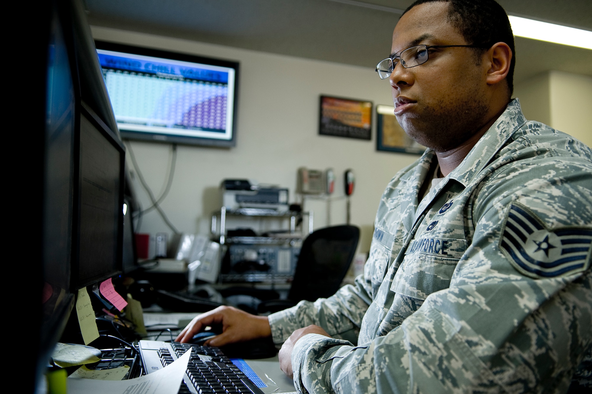 YOKOTA AIR BASE, Japan -- Tech. Sgt. Nicky Brown, 374th Operations Squadron, checks the current weather for Yokota and surrounding area March 28. The Mission Weather Element is responsible for weather briefings for Yokota to Sendai Airport supporting all missions flying relief supplies for Operation Tomodachi.  (U.S. Air Force photo/Master Sgt. Jeromy K. Cross)







