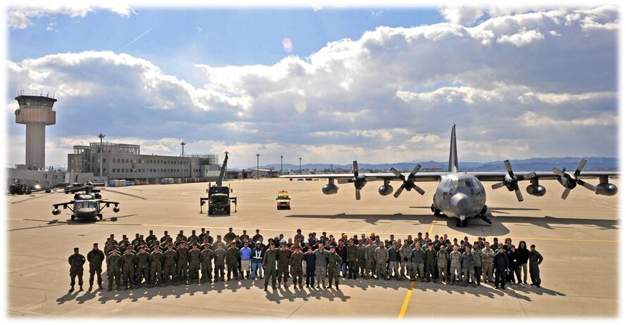 Japanese Self Defense Forces and U.S. military members recently gathered together on the tarmac at Sendai Airport, Japan. U.S. Airmen, Soldiers, Marines and Sailors rolled up their sleeves with their Japanese counterparts to clear debris from the runway and surrounding areas of the airport after the March 11, 2011 tsunami in order to begin relief aircraft operations. Sendai became a major hub for delivery of relief supplies to the affected areas. Pacific Air Forces Airmen have generated more than 400 aircraft missions and delivered approximately seven million pounds of cargo as of April 6, 2010, in support of Operation Tomodachi.  U.S. Air Force Airmen completed their restoration mission at Sendai April 4. The Sendai airport is scheduled to reopen for civilian commercial flights on April 12. (Courtesy of Japan Self Defense Force)  