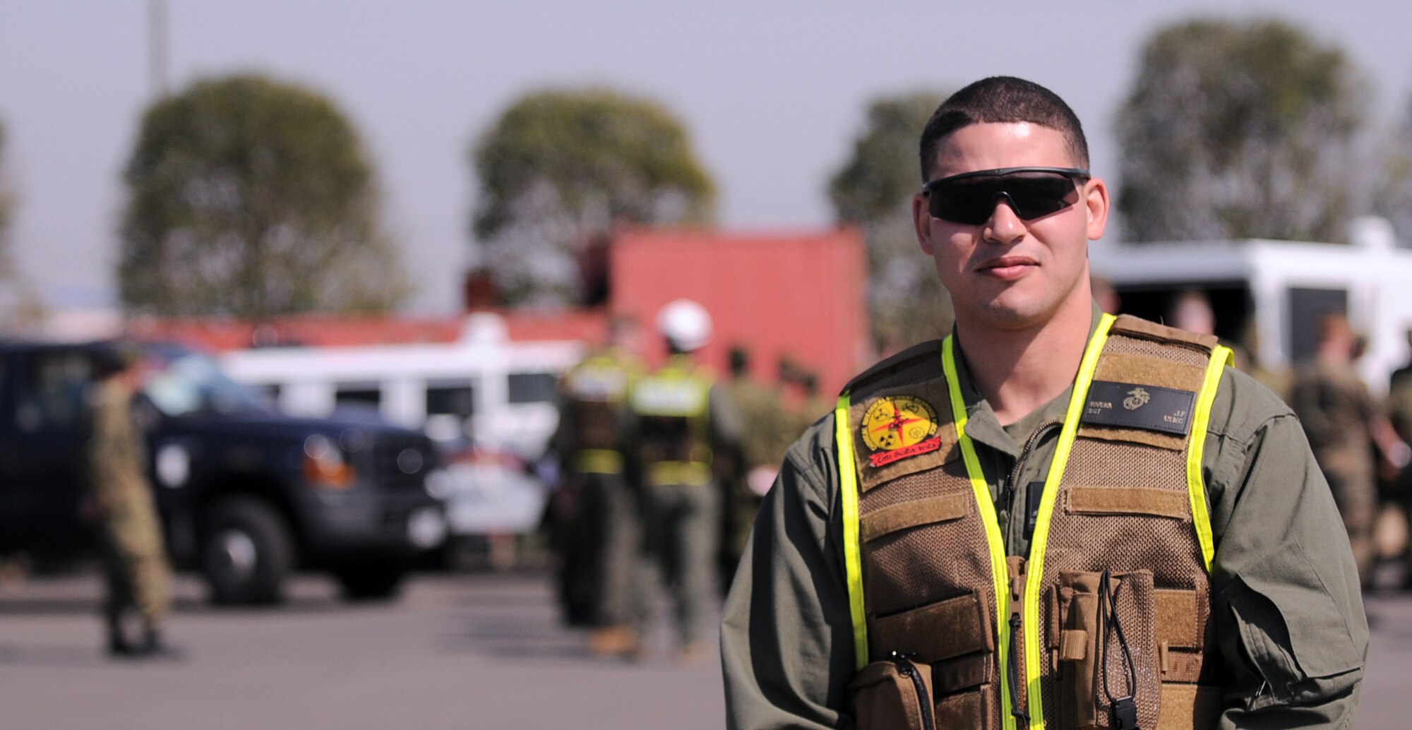 YOKOTA AIR BASE, Japan -- U.S. Marine Corps Sgt. Jose Rivera, chemical biological incident response force extractor from the Naval Surface Warfare Center, Indian Head, Md., poses for a photo at Yokota Air Base, Japan, April 6, 2011. Sergeant Rivera, a native of Brooklyn, N.Y., is currently deployed to Yokota in support of Operation Tomodachi. "I feel that this joint operation with the Japanese is a remarkable thing. This is a bad time for Japan and I am glad to be here to support them in any way we can," said Sergeant Rivera. (U.S. Air Force photo/Airman 1st Class Krystal M. Garrett) 
