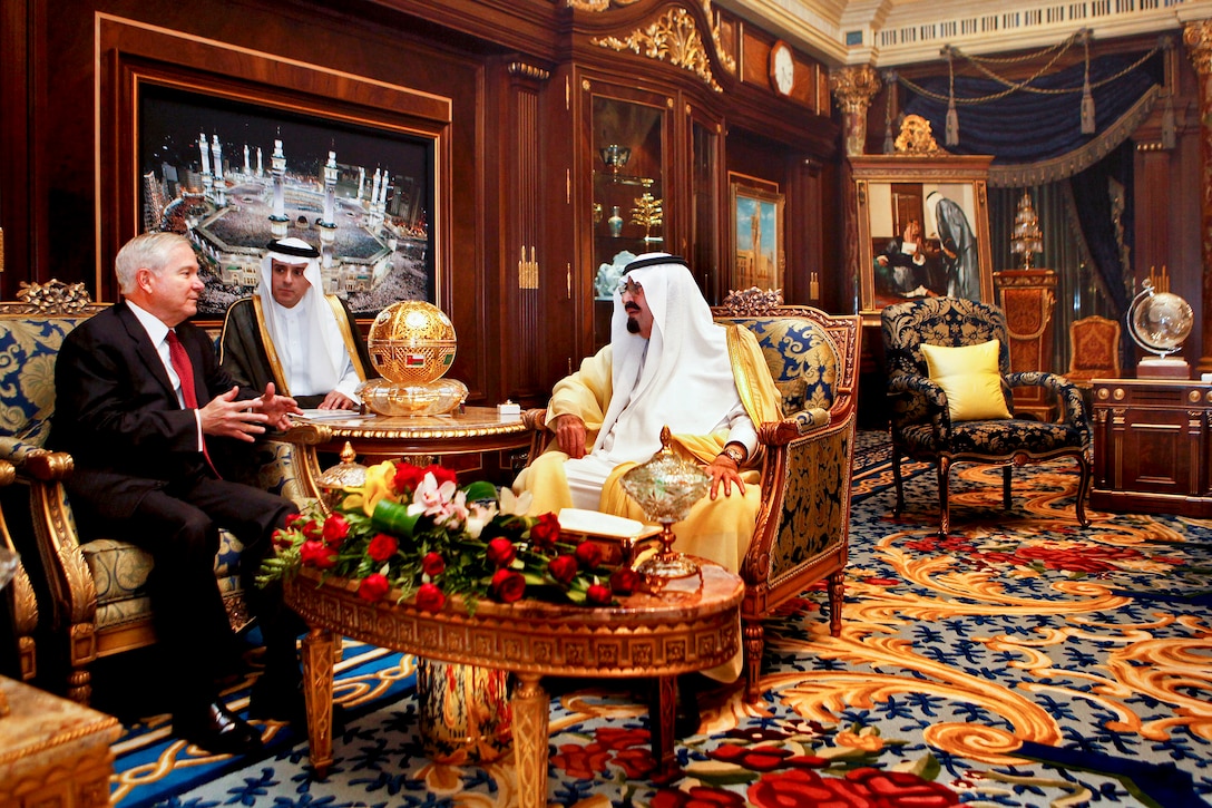 Saudi Arabia's King Abdullah receives U.S. Defense Secretary Robert Gates, left, as Ambassador to the U.S. Adel Al-Jubair, center, translates at Riyadh Palace in Riyadh, Saudi Arabia, April 6, 2011.