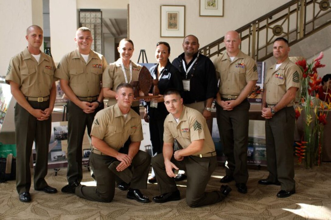 The Marines of MARFORPAC FWD with Rosanna Barcinas, Program Officer for Guam Preservation Trust, and Joshua Tenorio.