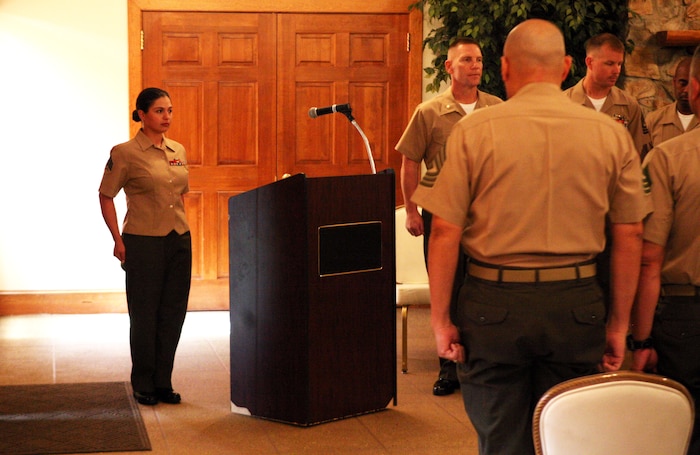 Marines with 2nd Maintenance Battalion, 2nd Marine Logistics Group, stand at the position of attention during a noncommissioned officers’ leadership course graduation ceremony aboard Camp Lejeune, N.C., April 8, 2011. NCOs with the battalion participated in a course focused on the fundamentals of Marine Corps drill, its history and customs and courtesies. (U.S. Marine Corps photo by Pfc. Franklin E. Mercado)