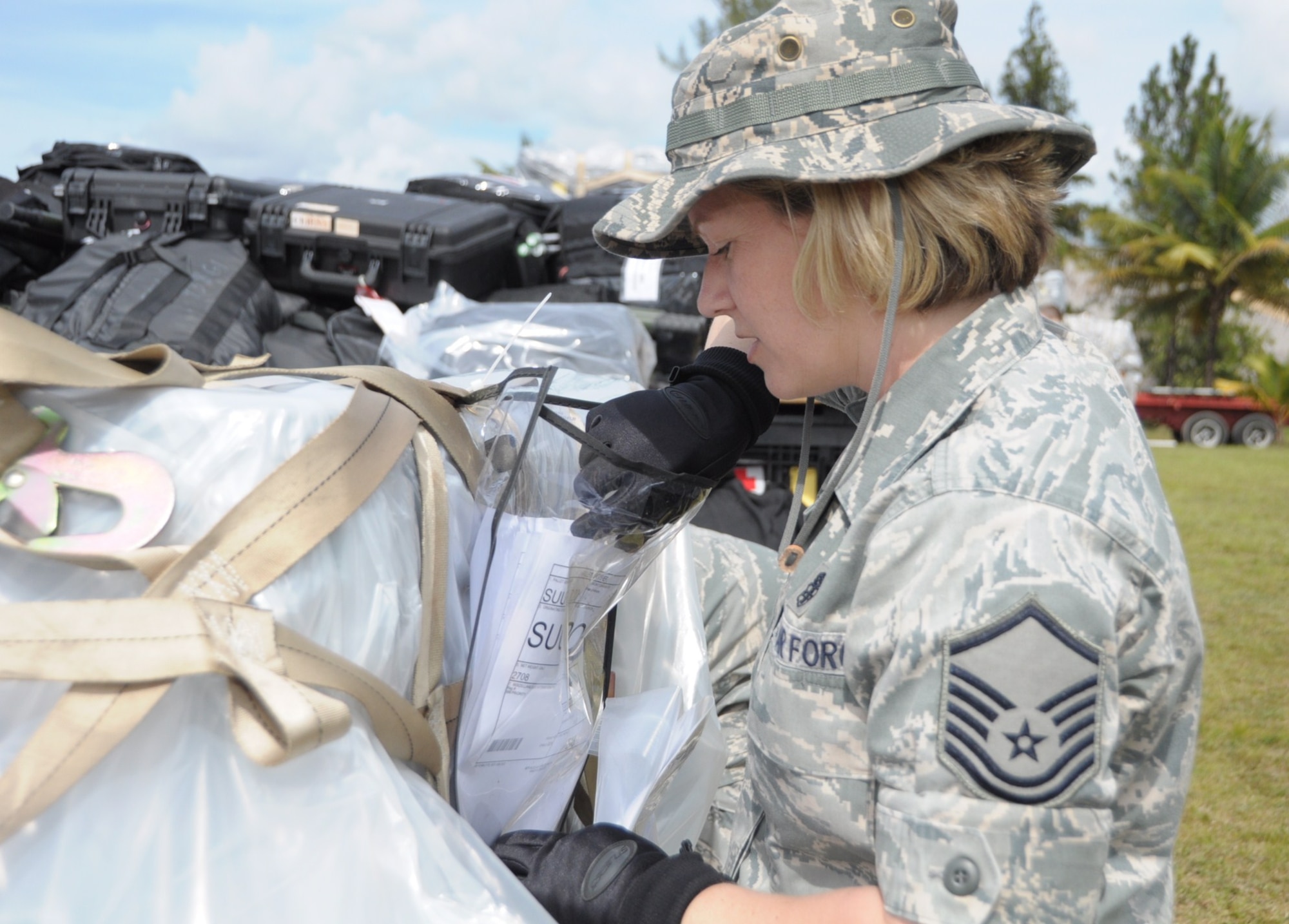 U.S. Air Force Master Sgt. Tanya Hubbard, medical technician begins to inspect the supply list on the pallets in Cumuto Barracks at Trinidad and Tobago April 8, 2011. Hubbard is a part of the Expeditionary Medical Support Health Response Team in support of the Allied Forces Humanitarian Exercise/Fuerzas Aliadas or FA HUM 2011. (U.S. Air Force photo by 2d Lt Joel Banjo-Johnson/Released)
