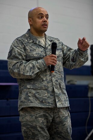 NELLIS AIR FORCE BASE, Nev.-- Tech. Sgt. DeAndre Scott, 99th Medical Group, public access defibrillation program manager, explains why knowing how to use an Automated External Defibrillator  is important during the AED Rodeo April 7. The rodeo is a 30 min. class held at the Nellis fitness center, that teaches participants how to use an AED. The PAD program set up the AED rodeo so service members and civilians working on base become more aware of the equipments potential to save lives. (U.S. Air Force photo by Airman 1st Class Matthew Lancaster)
