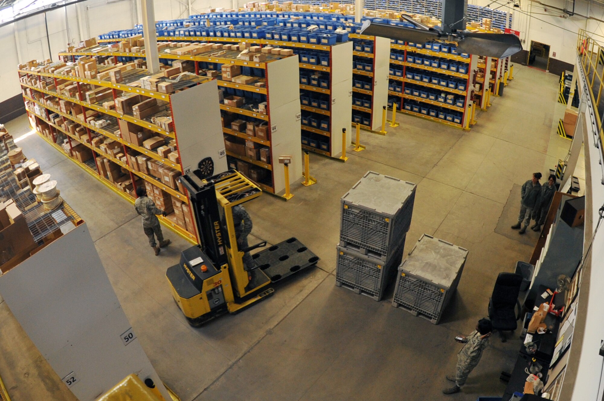Members of the 19th Logistics Readiness Squadron central storage personnel receive and pull orders for customers March 31, 2011, at Little Rock Air Force Base, Ark. Central storage staff members receive an average of 300 orders a day. (U.S. Air Force photo by Airman 1st Class Rusty Frank)