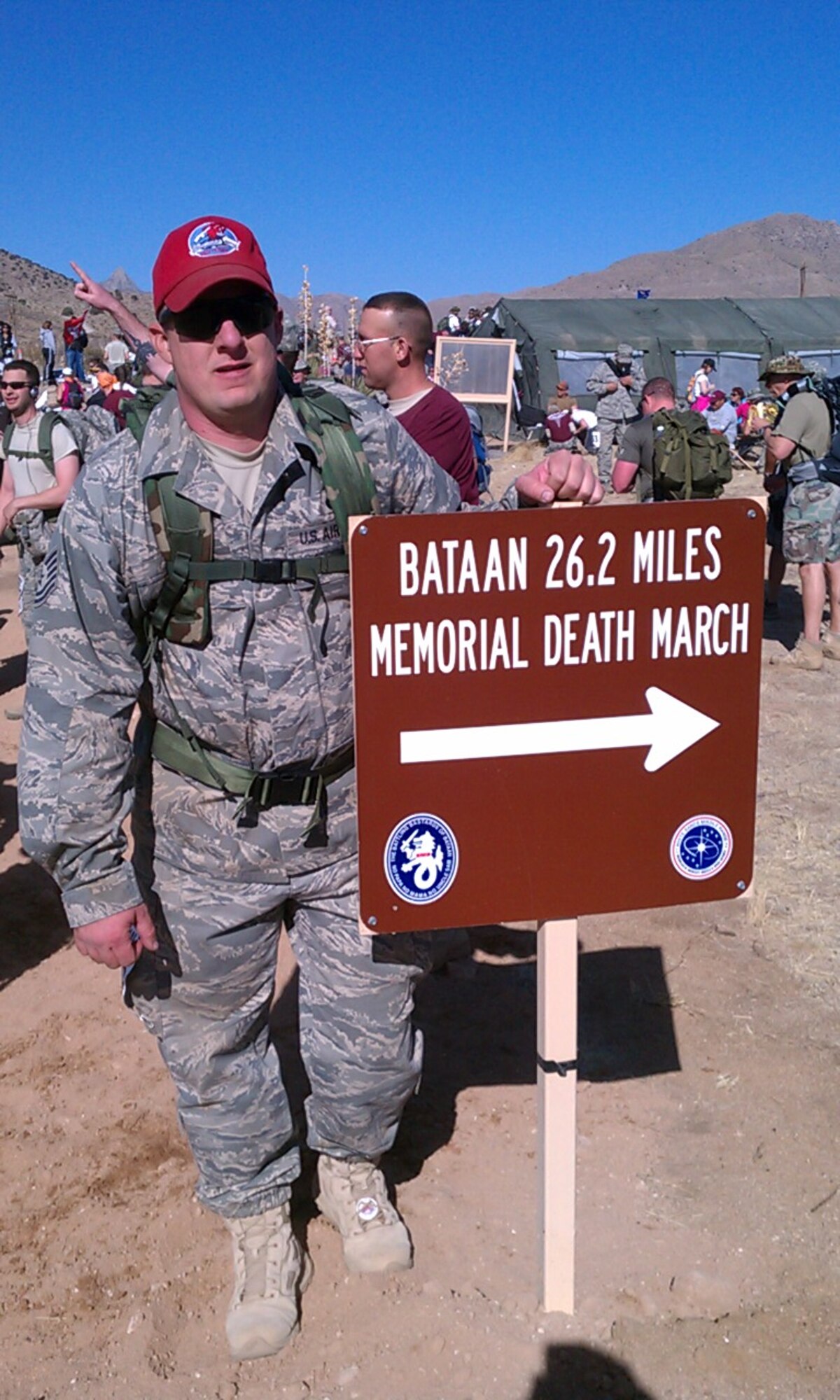 Tech. Sgt. Christopher Kruse, 820th REDHORSE vehicle maintenance craftsman, pauses before making the turn from the 15-mile course onto the 26.2-mile route at the 22nd Annual Bataan Memorial Death March, March 27, at White Sands Missile Range.  The event, attended by a record number of more than 6,000 marchers, commemorates the original Bataan Death March which occurred in the Philippines during World War II. (Courtesy photo)