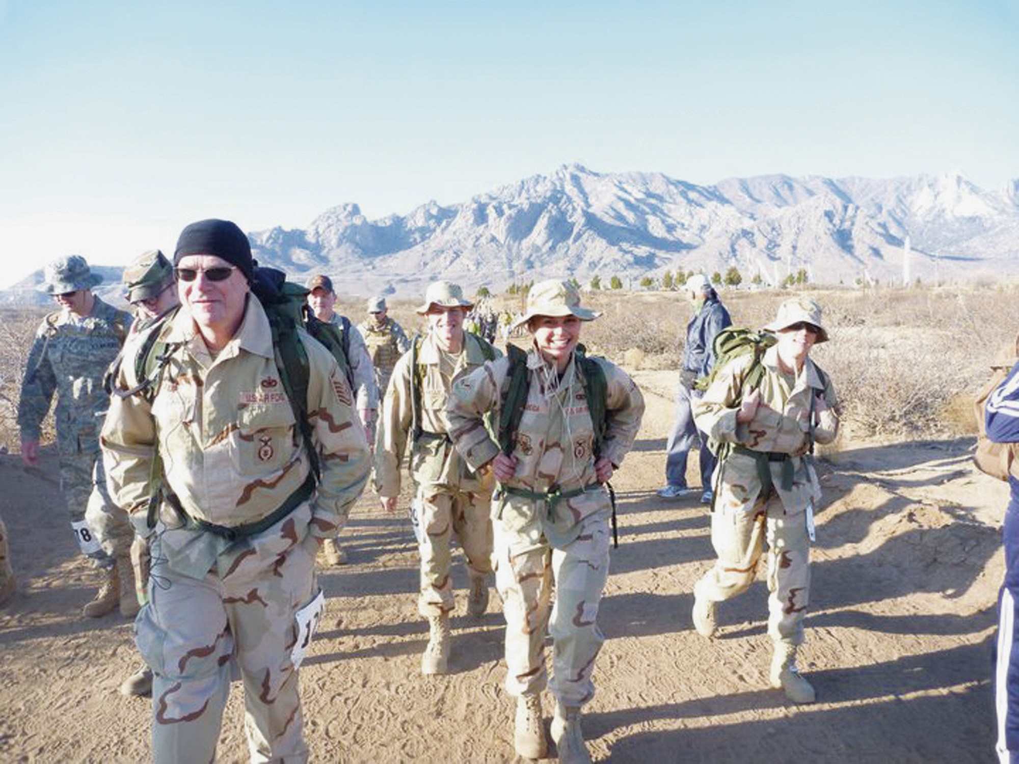 FROM LEFT: Jerold Haupt, 56th Security Forces Squadron standardized evaluations chief; Senior Airman Keegan Donnelly, 56th SFS Vehicle Control NCO; Senior Airman Rebecca Alger, 56th SFS patrolman; and Staff Sgt. Diana Donnelly, 56th SFS unit scheduler, participated March 27 in the Bataan Memorial Death March in the terrain surrounding the White Sands Missile Range, N.M.  The members trained several months in preparation to march the 26.2 miles in honor of the service members who protected the Philippines during World War II and became prisoners of war.  (Courtesy photo)