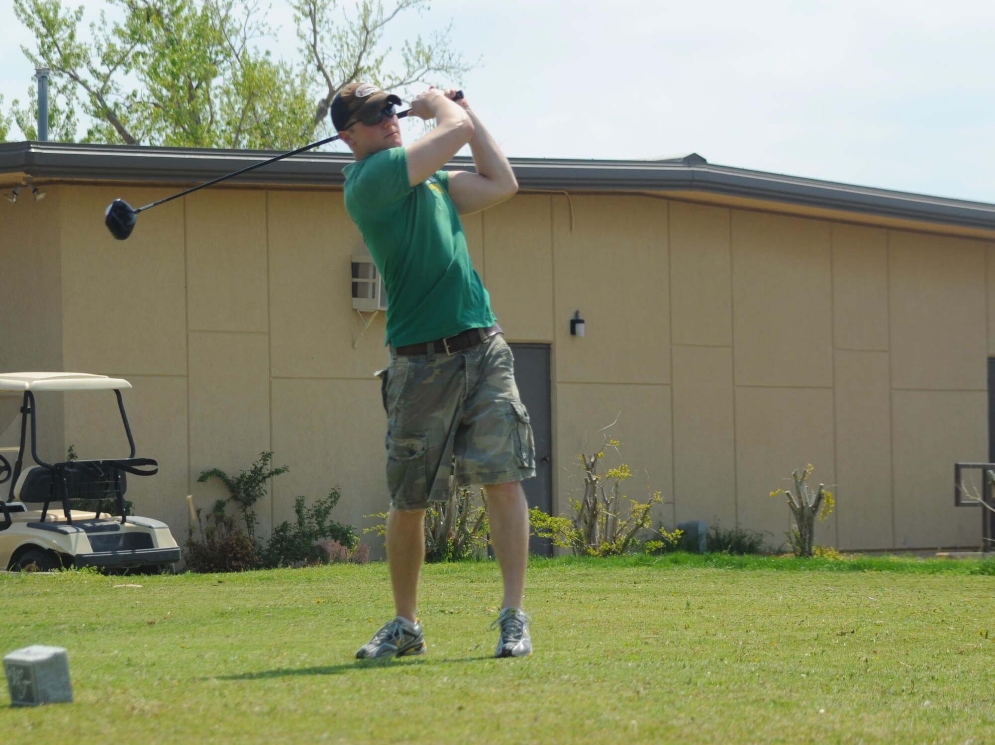 ALTUS AIR FORCE BASE, Okla. – 2nd Lt. Cory Wagner, 97th Logistics Readiness Squadron fuels flight commander, tees off during the 2nd Annual Sexual Assault Prevention and Response Golf Tournament. One third of the entry fees went to the local Associated Christian Ministry Incorporated House. April is Sexual Assault Awareness Month. (U.S. Air Force photo by Airman 1st Class Myles Stepp / Released 97th Air Mobility Wing Public Affairs)