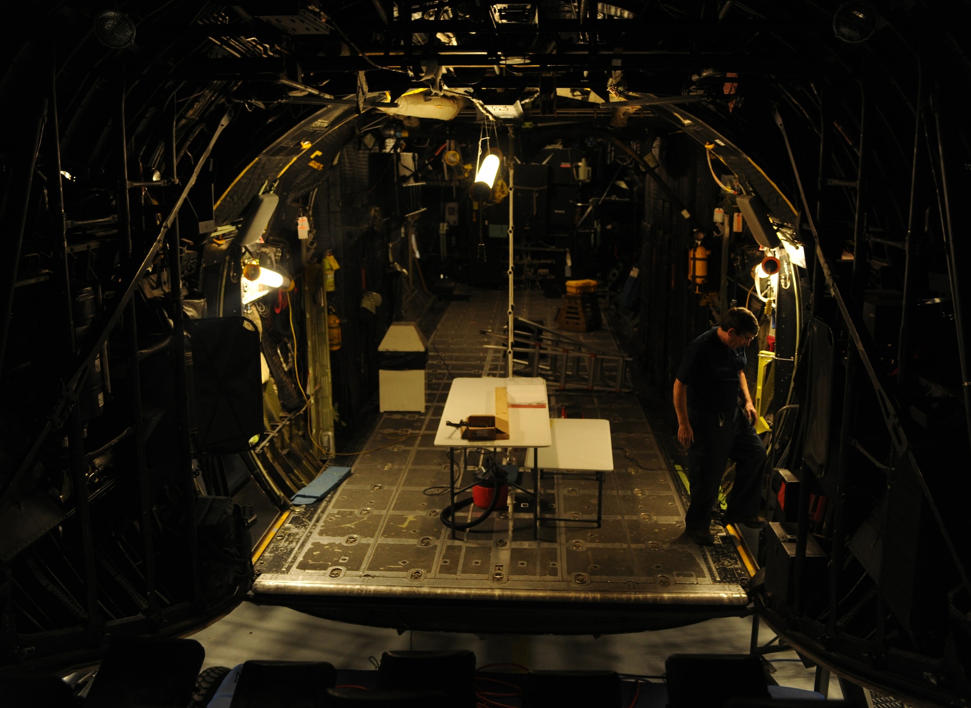 MOODY AIR FORCE BASE, Ga.-- Robert Green, contracted structural technician lead, prepares tools to build the new loadmaster crashworthy seat April 7. The new seat will be safer for loadmasters to use during flights. (U.S. Air Force photo/Airman 1st Class Benjamin Wiseman)(RELEASED)