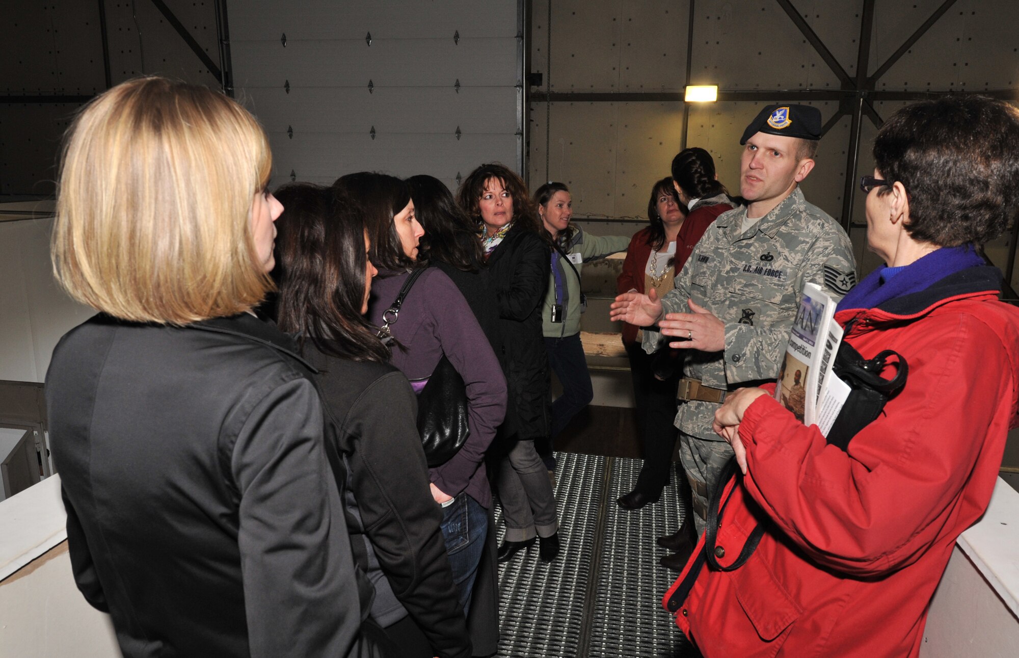 Tech. Sgt. Robert Renfrow, 341st TRF flight sergeant, answers questions from the Civ-Aires members following a demonstration in the shoot house April 5.  (U.S. Air Force photo/Beau Wade)