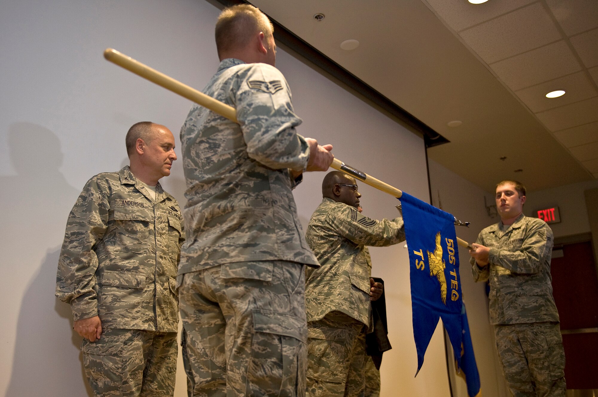 Airmen case the 505th Operations Squadron guidon during a redesignation ceremony April 5, 2011, at Nellis Air Force Base, Nev. The 505th Operations Group and 505th Operations Squadron became the 505th Test and Evaluation Group and 505th Test Squadron during the ceremony. (U.S. Air Force photo/Airman 1st Class Daniel Hughes)