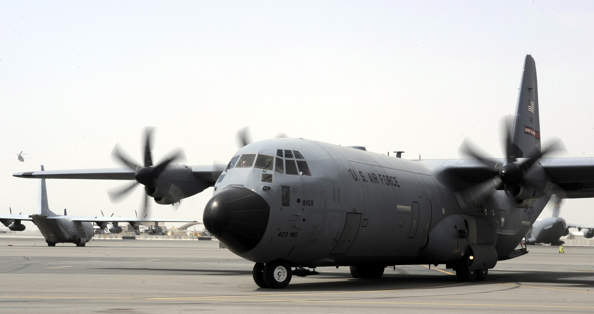 A C-130J Hercules taxis to the runway for an airdrop mission April 8, 2011, at Kandahar Airfield, Afghanistan. The 772nd Expeditionary Airlift Squadron set a record number of airdrops during the month of March with 72 airdrops of more than 1.5 million pounds of supplies for ground troops across Afghanistan. (U.S. Air Force photo/Senior Airman Willard E. Grande II)