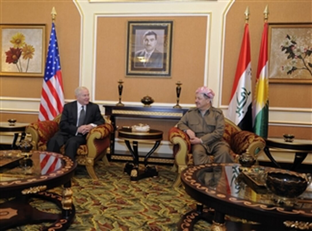 Secretary of Defense Robert M. Gates talks with Kurdistan Regional Government President Barzani after arriving in Irbil, Iraq, during a trip on April 8, 2011.  Gates met with U.S. and Iraqi leaders, troops and held discussions while taking photos and giving out coins to deployed members during his stay in Iraq.  