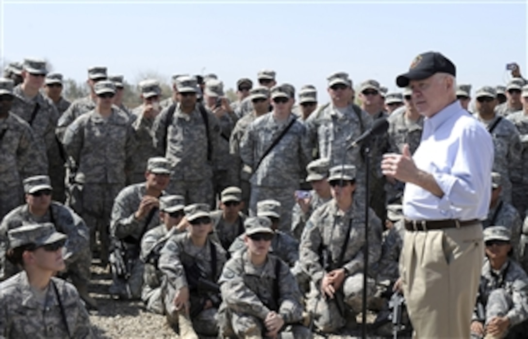 Secretary of Defense Robert M. Gates talks with soldiers of the 2/1 Advise and Assist Brigade during a visit to Camp Victory, Iraq, on April 7, 2011.  Gates took questions and held an open discussion on issues the deployed soldiers have.  