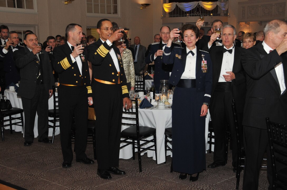 OMAHA, Neb. - U.S. Strategic Command leadership, including Vice Adm. Cecil D. Haney, USSTRATCOM deputy \rcommander; Gen. C. Robert Kehler, USSTRATCOM commander; and Maj. Gen. Susan Y. Desjardins, USSTRATCOM\rdirector, plans and policy, toast with various guests during the 111th Submarine Birthday Ball held April \r8 at the Scoular Building Ballroom.