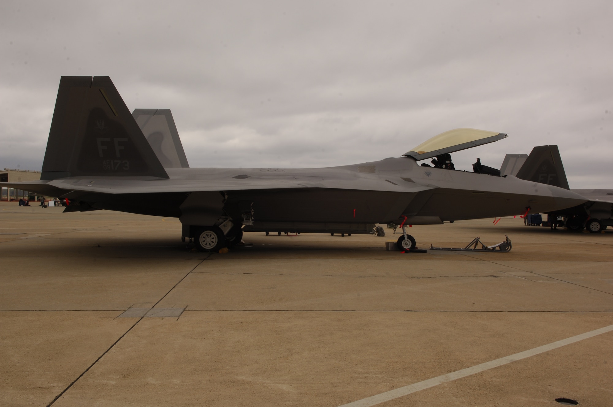 An F-22 Raptor stands ready to deploy during an Operational Readiness Inspection at Langley Air Force Base, Va., April 9, 2011. This is the first ORI for fifth generation aircraft, like the F-22 Raptor. (U.S. Air Force photo by Airman 1st Class Camilla Elizeu/Released)  
