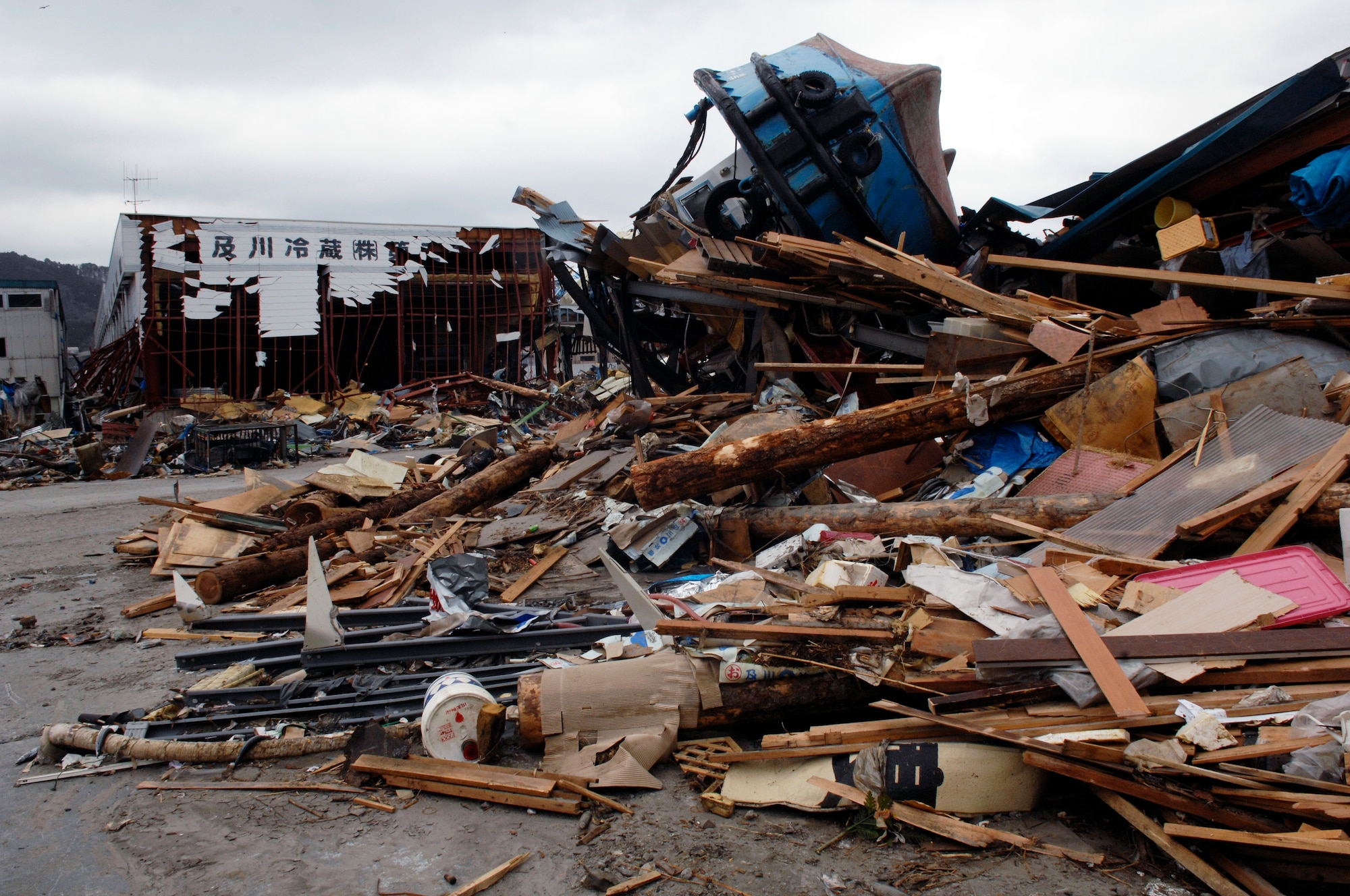 During a search and recovery mission in Ofunato, Japan on March 15, 2011, the Los Angeles County Fire Urban Search and Rescue Team, Task Force 2, who travelled with the 452nd Air Mobility Wing, March Air Reserve Base, Calif., to the earthquake and tsunami stricken areas of Japan just four days after the devastation, were faced with this and similar scenes for miles.  (U.S. Air Force photo/Technical Sgt. Daniel St. Pierre)