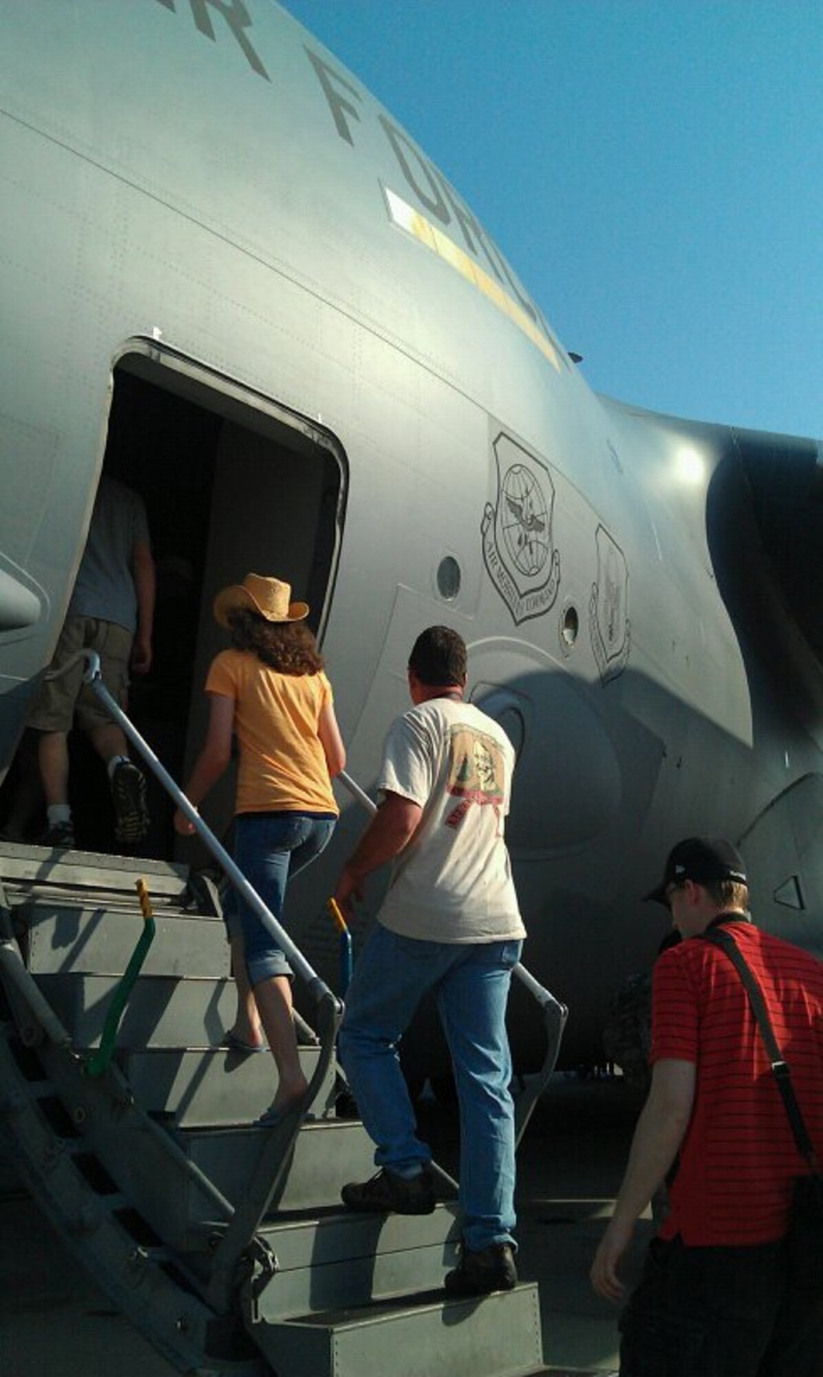 Dozens of people crammed the cargo deck of a static C-17 Globemaster III display at Joint Base Charleston, S.C. during the Charleston Air Expo 2011 April 9, 2011. (U.S. Air Force Photo by Michael Dukes)