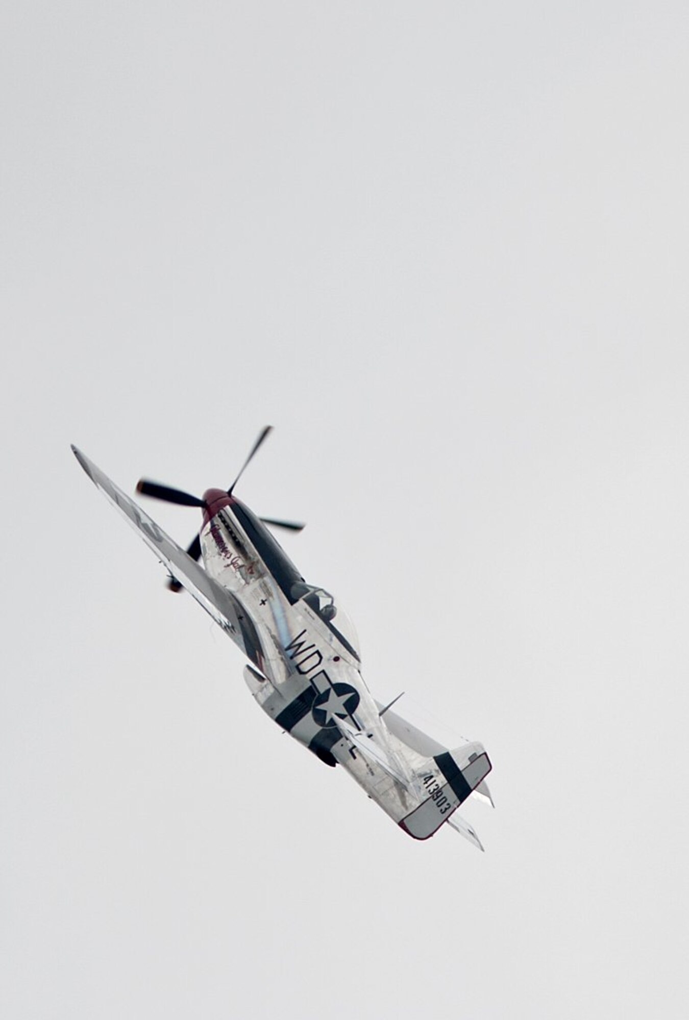 A P-51 Mustang "Glamorous Girl" performs at the Charleston Air Expo 2011 at Joint Base Charleston April 9, 2011.  (U.S. Air Force photo by Michael Dukes)