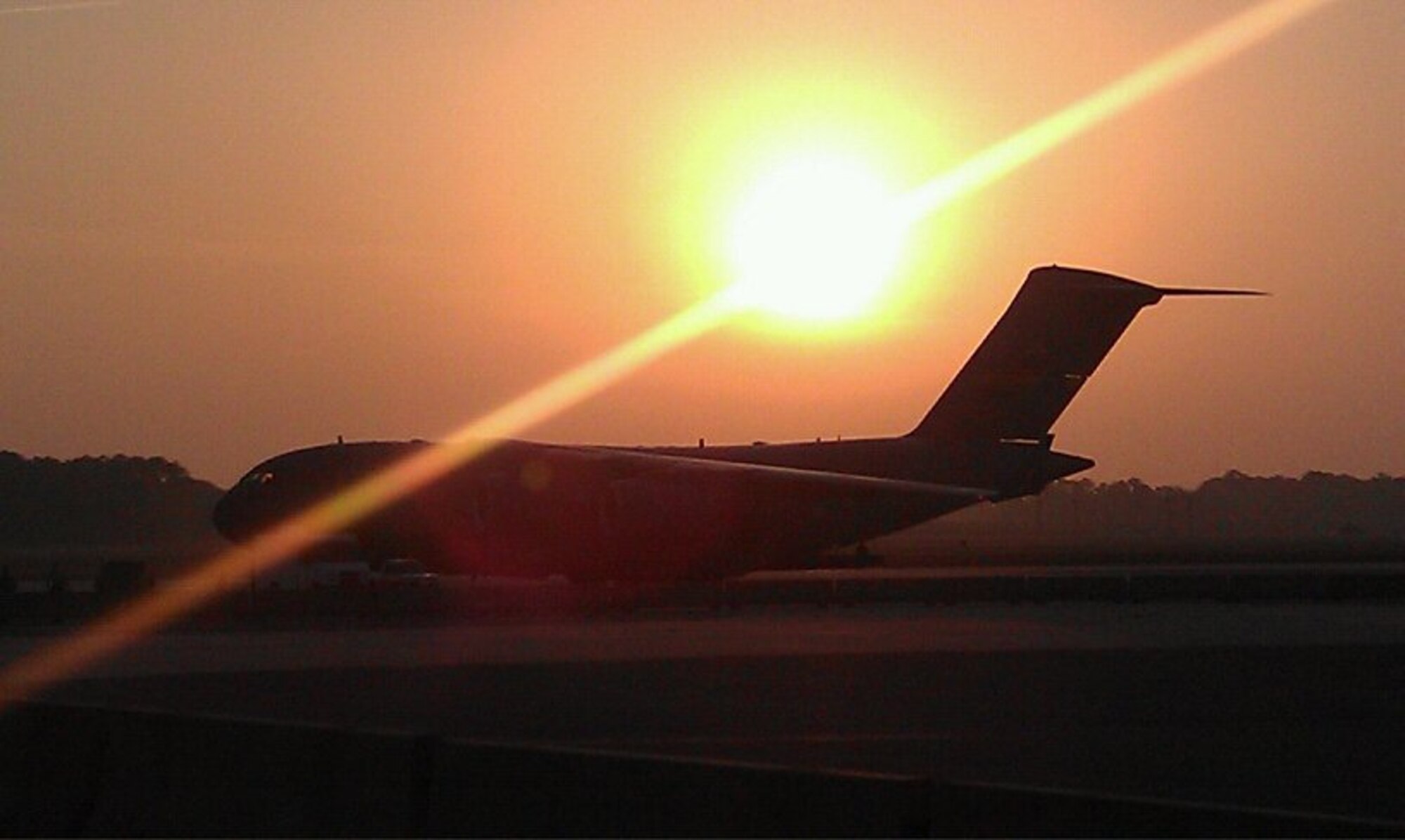 A Charleston C-17 Globemaster III sits on the flight line at Joint Base Charleston, S.C. in the early hours before Charleston Air Expo 2011 opened it's gates to the public on April 9, 2011. (U.S. Air Force photo by Michael Dukes)