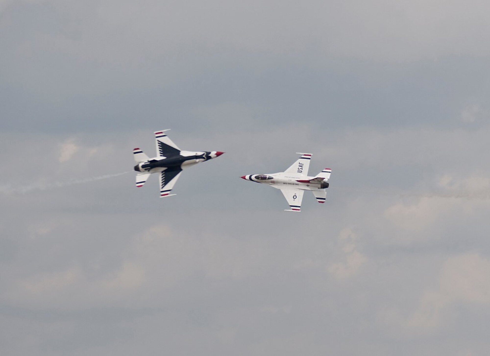 The U.S. Air Force Thunderbirds demonstrate their precision flying April 8 for military members and their families at Joint Base Charleston, S.C. as part of Charleston Air Expo 2011. The Thunderbirds performed for nearly 100,000 people on April 9 when the event was open to the public. (U.S. Air Force photo by Michael Dukes)