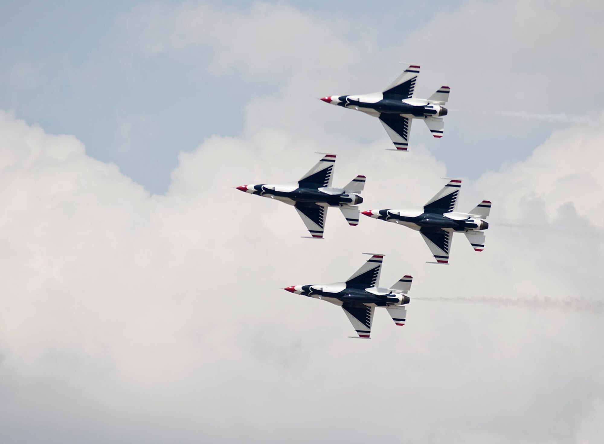 The U.S. Air Force Thunderbirds demonstrate their precision flying April 8 for military members and their families at Joint Base Charleston, S.C. as part of Charleston Air Expo 2011. The Thunderbirds performed for nearly 100,000 people on April 9 when the event was open to the public. (U.S. Air Force photo by Michael Dukes)