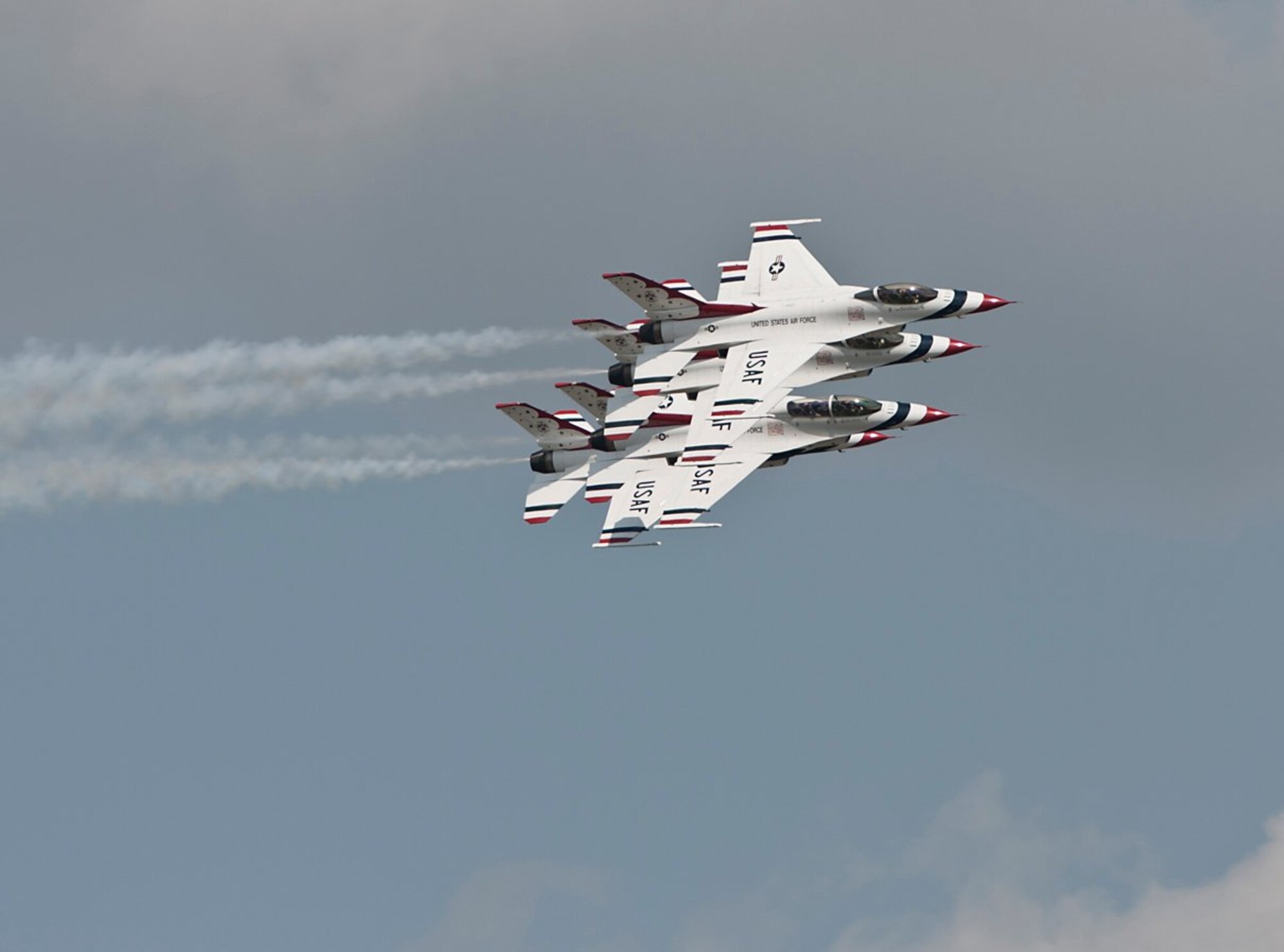 The U.S. Air Force Thunderbirds demonstrate their precision flying April 8 for military members and their families at Joint Base Charleston, S.C. as part of Charleston Air Expo 2011. The Thunderbirds performed for nearly 100,000 people on April 9 when the event was open to the public. (U.S. Air Force photo by Michael Dukes)