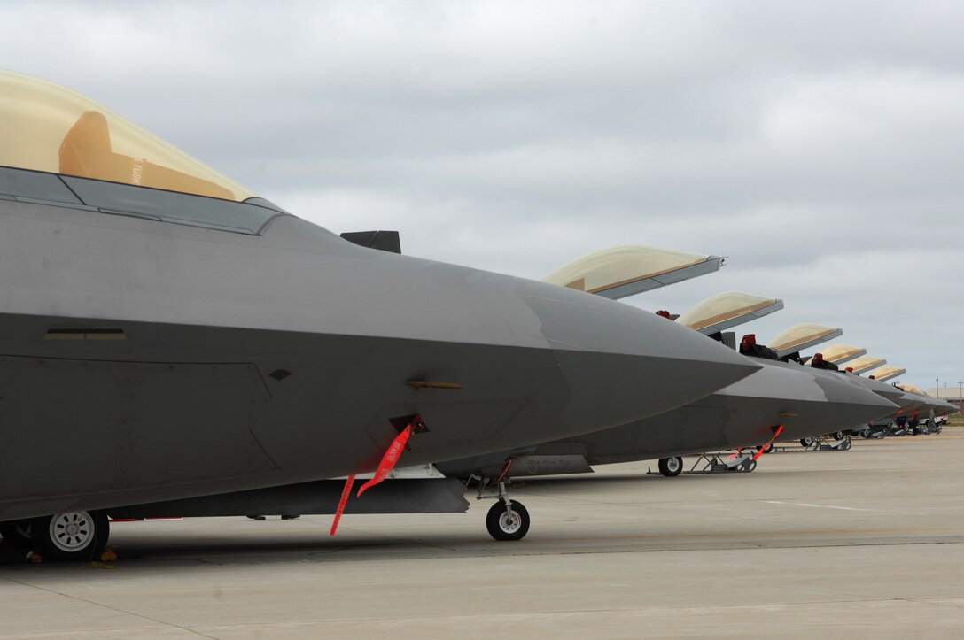 F-22 Raptors prepare for deployment during an Operational Readiness Inspection at Langley Air Force Base, Va., April 9, 2011. Personnel from the 633d Air Base Wing, 1st Fighter Wing and 192 FW participated in a two-day inspection that evaluates an installation's ability to efficiently deploy military members and rapidly adjust to changing security conditions. (U.S. Air Force Photo/Airman 1st Class Teresa Zimmerman/Released)