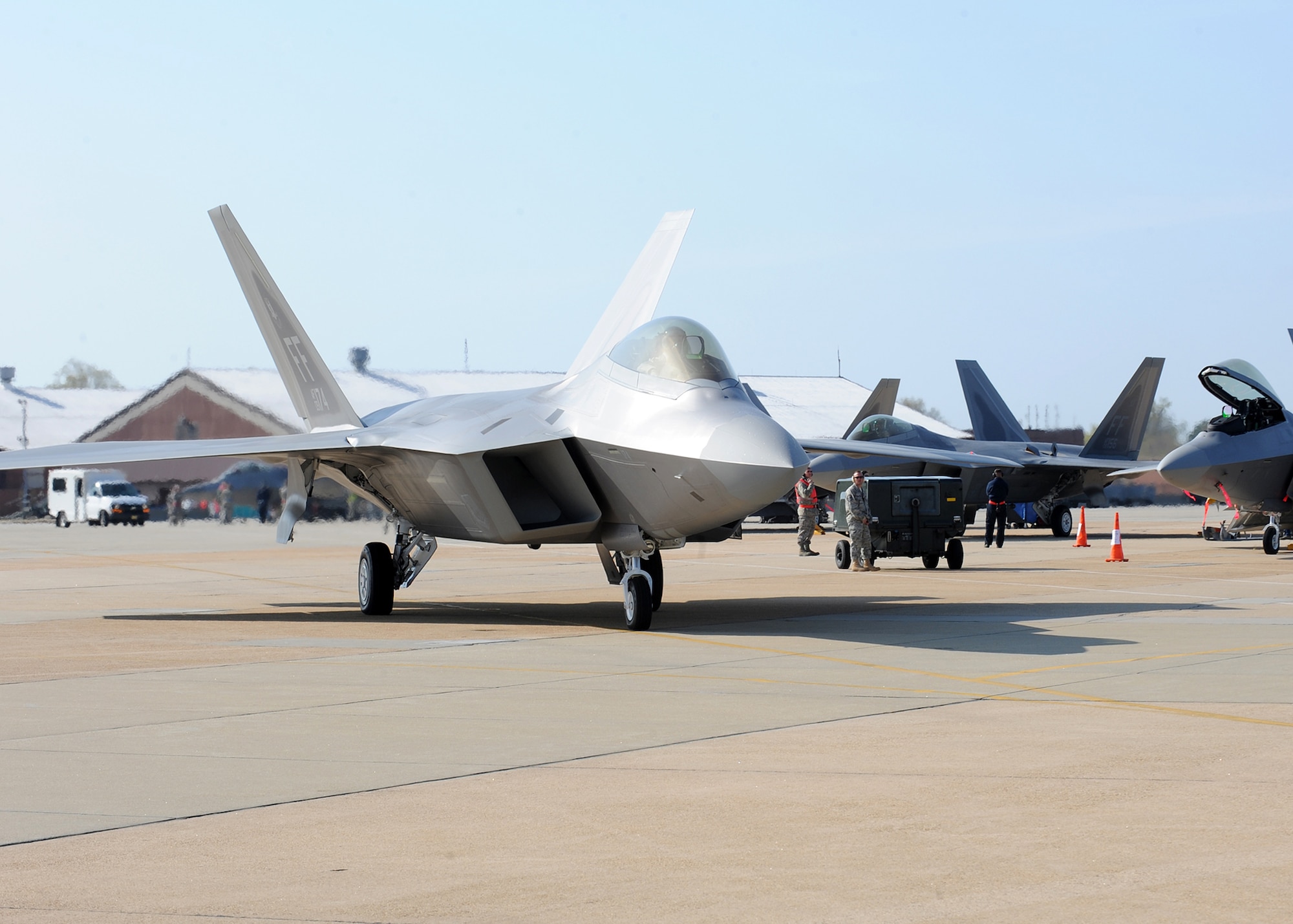 An F-22 Raptor taxis to the runway during the Operational Readiness Inspection at Langley Air Force Base, Va., April 10, 2011. The inspection evaluates an installation's ability to efficiently deploy military members, cargo and equipment while also adjusting to rapidly changing security conditions. (U.S. Air Force Photo/Senior Airman Zachary Wolf)