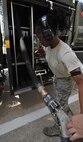Airman 1st Class Clarissa Fields, 23rd Logistics Readiness Squadron fuels distribution operator, pulls out a fuel line in preparation to refuel an A-10C Thunderbolt II at Moody Air Force base, Ga. April 11. The fuels truck holds 6,000 gallons of fuel and can refuel 4 to 5 A-10s in one refueling session. (U.S. Air Force photo/Airman 1st Class Joshua Green)

