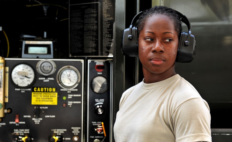 Airman 1st Class Clarissa Fields, 23rd Logistics Readiness Squadron fuels distribution operator, stands next to a fuels truck during a refueling session at Moody Air Force base, Ga. April 11. From the time notification is received that an A-10C Thunderbolt II needs to be refueled, distribution operators have 30 minutes to complete the refueling job. (U.S. Air Force photo/Airman 1st Class Joshua Green)
