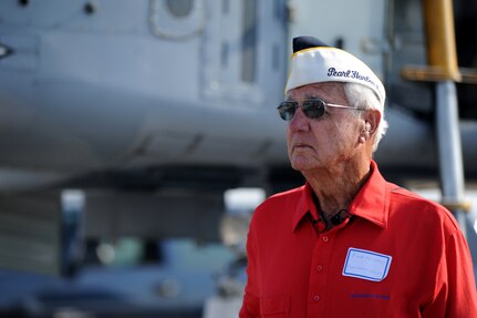 Buck Morris prepares for an interview during the Charleston Air Expo 2011  April 9.  Mr. Morris is a Navy veteran and a survivor of the attack on Pearl Harbor .  He celebrated his 89th birthday by attending the Air Expo which attracted nearly 80,000 people.  (U.S. Air Force photo/ Staff Sgt. Nicole Mickle)  
