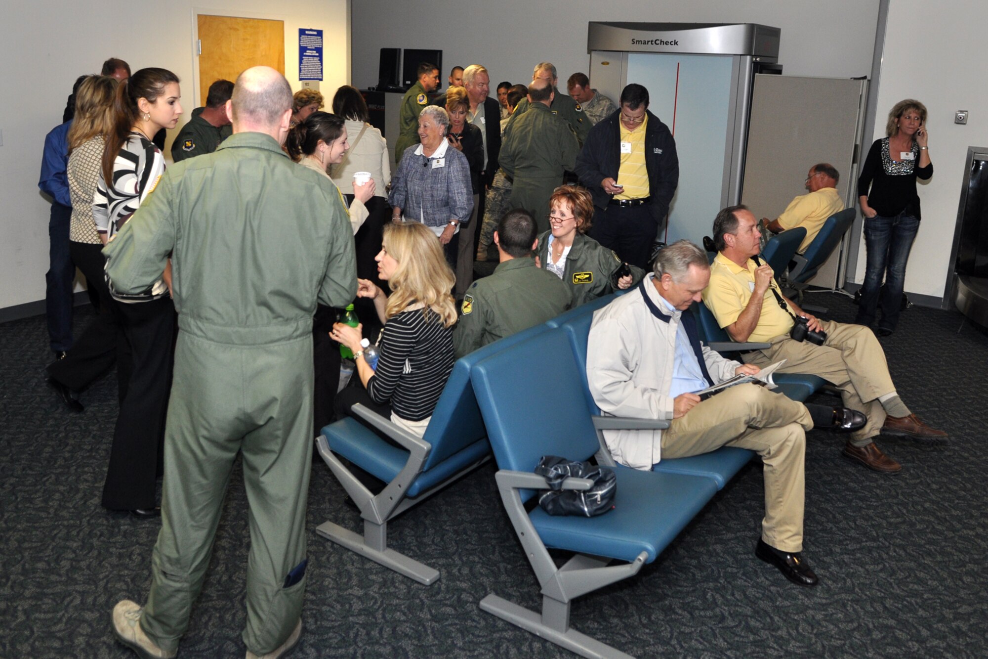 Participants in the 307th Bomb Wing Civic Leader Tour gather in a safe room in the passenger terminal at Patrick Air Force Base, Fla., during a tornado warning March 31, 2011. The 307th BW from Barksdale Air Force Base, La., showcased its mission capabilities over a four-day period for local civic leaders as well as the employers and clergy of some the bomb wing’s Airmen during three back-to-back community support events March 30 – April 2, 2011. Civic leaders witnessed the refueling of A-10 Thunderbolts during their flight to Patrick AFB. Once they arrived, they received briefings about the 920th Rescue Wing, 45th Space Wing, and the 301st Rescue Squadron. The KC-135 Stratotanker was unable to make the scheduled departure due to safety considerations due to the bad weather. The civic leaders returned to Barksdale on April 1, a day later than expected. (U.S. Air Force photo/Tech. Sgt. Jeff Walston)