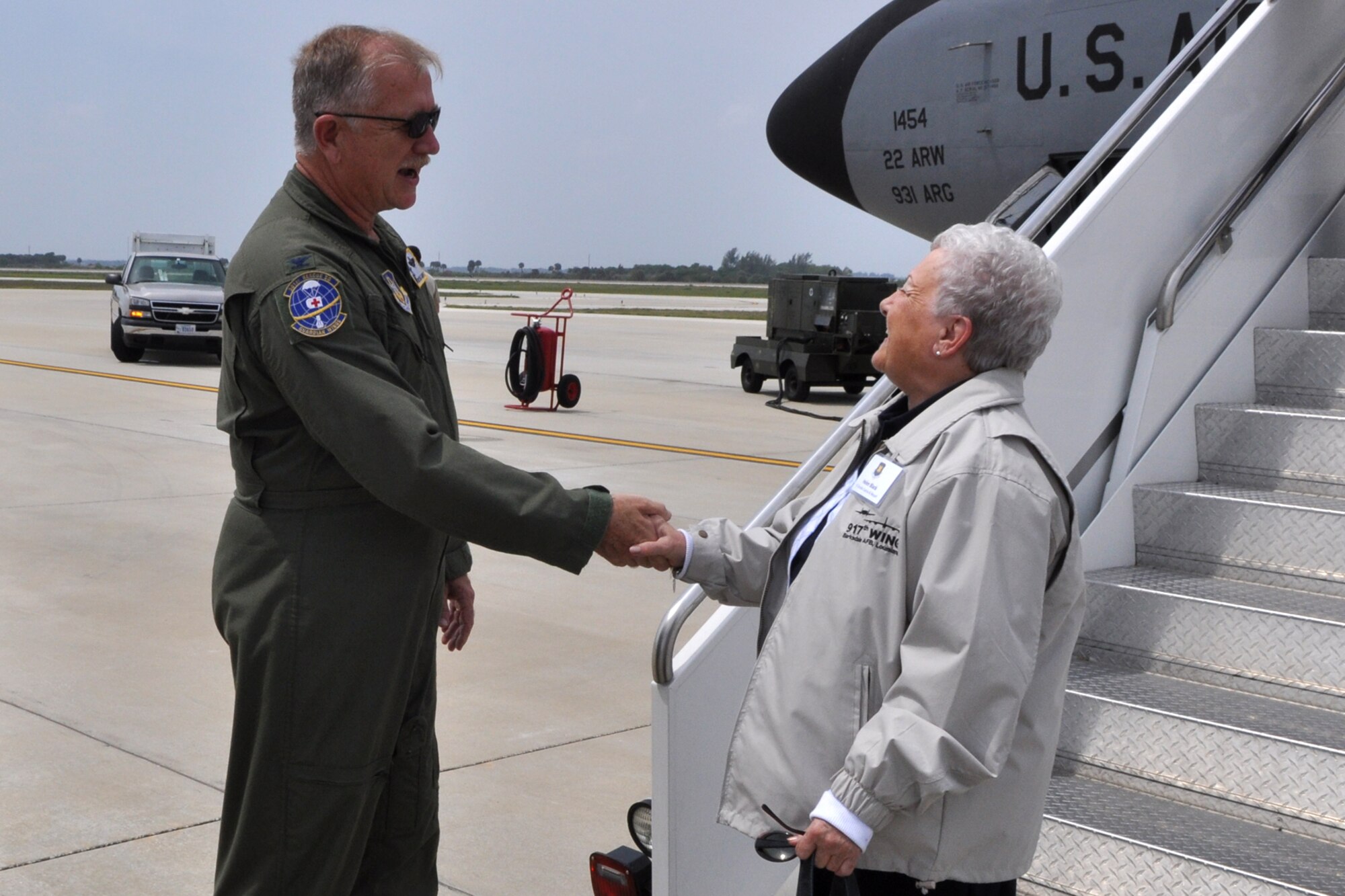Col. Robert L. Dunn, commander, 920th Rescue Wing, Patrick Air Force Base, Fla., welcomes Mrs. Helen Black, director of community development for the Eldorado Resort, Shreveport, La., upon her arrival at Patrick AFB, March 30, 2011. Mrs. Black was taking part in the 307th Bomb Wing Civic Leader Tour visiting the base. The 307th BW from Barksdale Air Force Base, La., showcased its mission capabilities over a four-day period for local civic leaders as well as the employers and clergy of some the bomb wing’s Airmen during three back-to-back community support events March 30 – April 2, 2011. Civic leaders witnessed the refueling of A-10 Thunderbolts during their flight to Patrick AFB. Once they arrived, they received briefings about the 920th Rescue Wing, 45th Space Wing, and the 301st Rescue Squadron. (U.S. Air Force photo/Tech. Sgt. Jeff Walston)